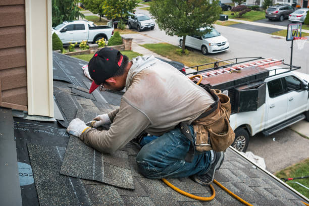 Professional Roofing technician working in Lewisville, NC